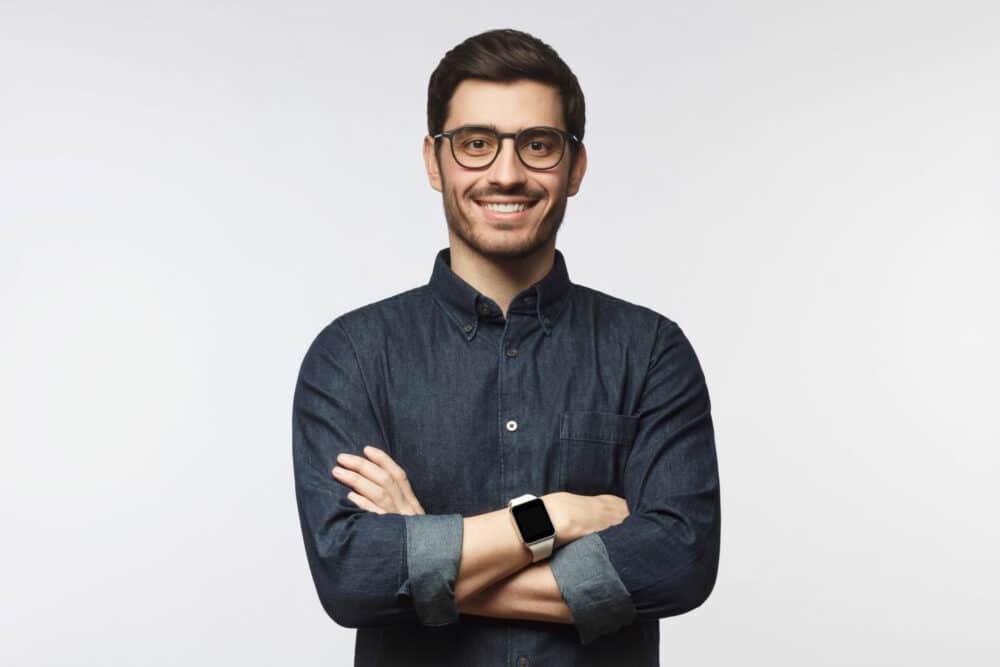 man with crossed arms working as product manager